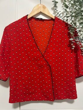 Mango Red Polka Dot Short Sleeve Wrap-Style Blouse with Black Trim